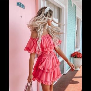 Pink ruffled off the shoulder dress, size M.